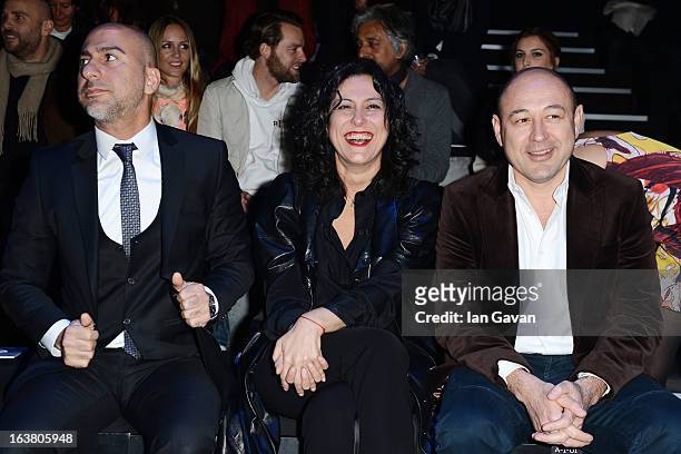 Volkan Atik, Mehtap Elaidi and Sinan Oncel attend the Best of Mercedes-Benz Fashion Week Istanbul Fall/Winter 2013/14 at Antrepo 3 on March 16, 2013...
