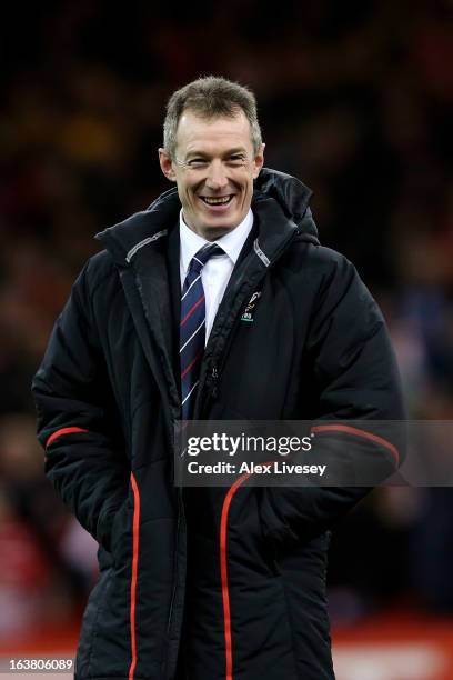 Wales caretaker coach Rob Howley celebrates his team's victory following the final whistle during the RBS Six Nations match between Wales and England...