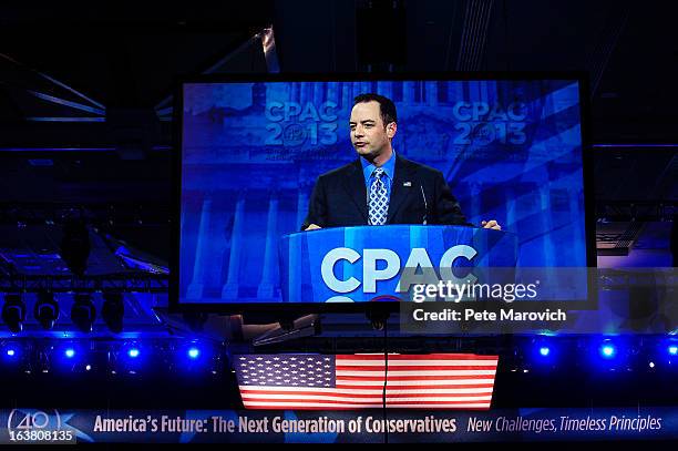Reince Priebus, Chairman of the Republican National Committee, speaks on a screen at the 2013 Conservative Political Action Conference March 16, 2013...