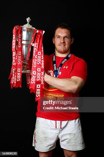 Prop Gethin Jenkins poses with the Six Nations trophy following his team's victory during the RBS Six Nations match between Wales and England at...