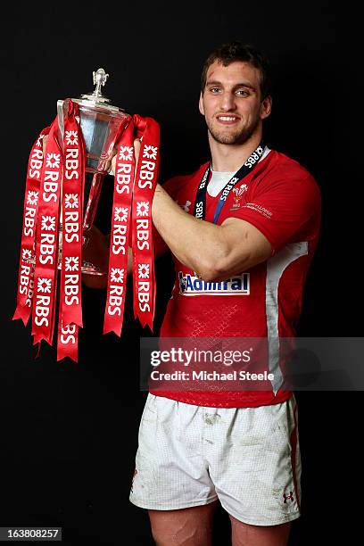 Sam Warburton poses with the Six Nations trophy following his team's victory during the RBS Six Nations match between Wales and England at Millennium...