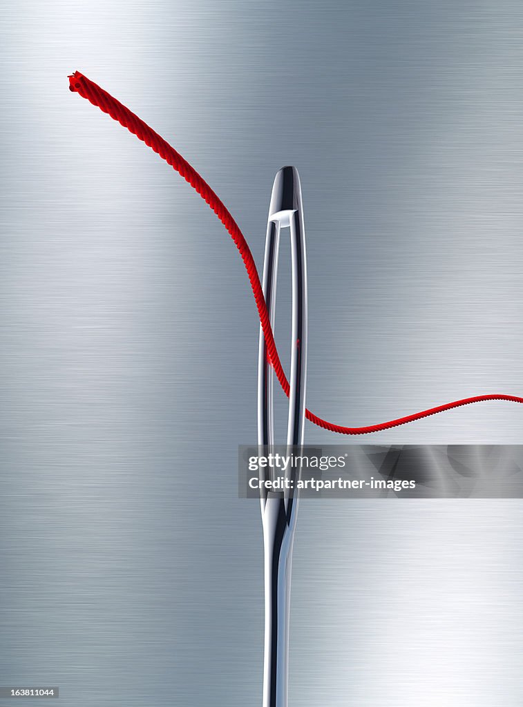 Needle Definition Sewing Needle With A Red Thread Through The Eye High-Res Stock Photo ...