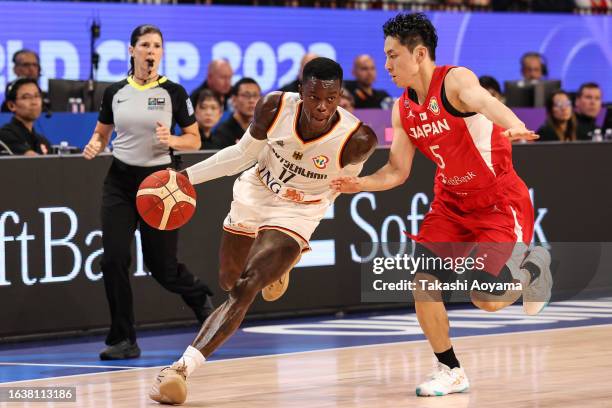 Dennis Schroder of Germany drives to the basket against Yuki Kawamura of Japan during the FIBA World Cup Group E game between Germany and Japan at...