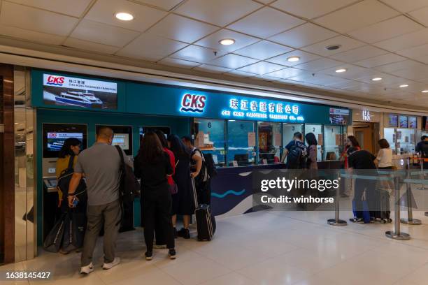 china ferry terminal in tsim sha tsui, kowloon, hong kong - ferry terminal stock pictures, royalty-free photos & images