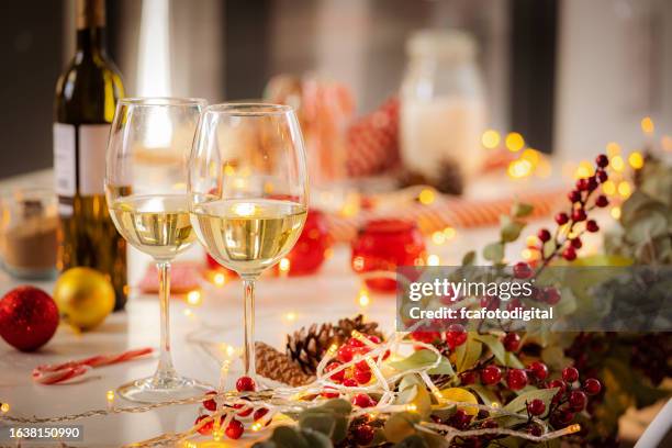 white wine for christmas holidays celebration - vitt vin bildbanksfoton och bilder