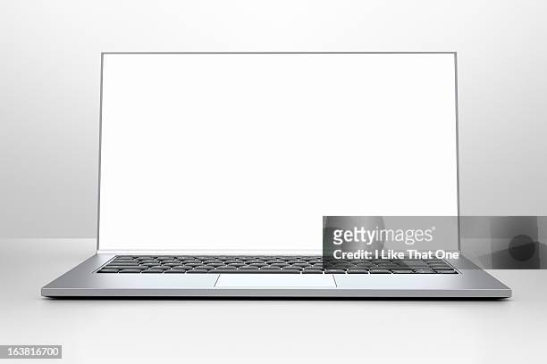 open laptop computer with bright screen - computer plain background stock pictures, royalty-free photos & images