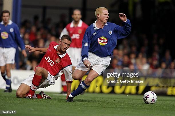 Neil Lennon of Leicester City is challenged by Stephen Hughes of Arsenal during the FA Carling Premiership game at Filbert Street, Leicester,...