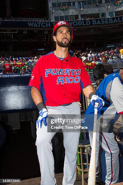 Angel Pagan of Team Puerto Rico is seen in the dugout before Pool 2, Game 6 against Team Dominican Republic in the second round of the 2013 World...