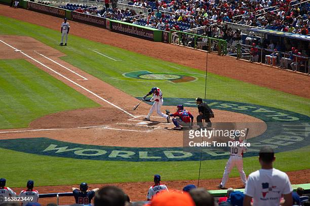 Robinson Cano of Team Dominican Republic bats during Pool 2, Game 6 against Team Puerto Rico in the second round of the 2013 World Baseball Classic...