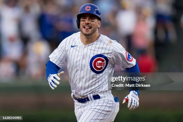 Mike Tauchman of the Chicago Cubs reacts after hitting a home run in a game against the Washington Nationals at Wrigley Field on July 19, 2023 in...