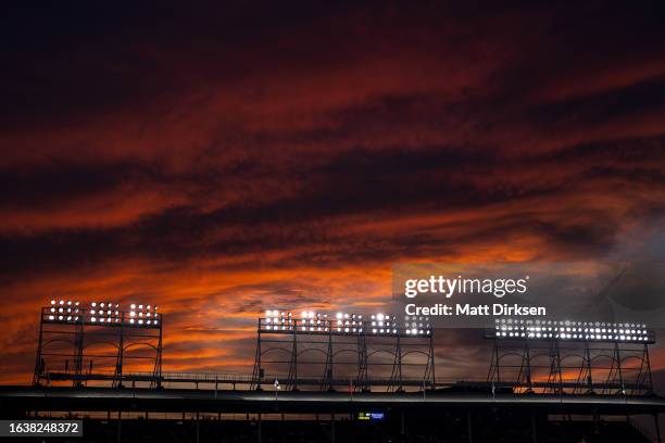 General view of the lights at sunset of a game between the Chicago Cubs and the Washington Nationals at Wrigley Field on July 19, 2023 in Chicago,...