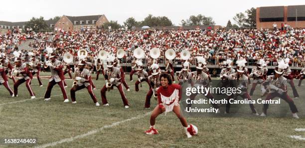 North Carolina Central University band performing on football field during football game.