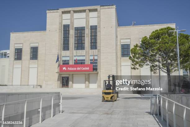 Worker transits near the "Palazzo del Cinema" ahead of the 80th Venice International Film Festival 2023 on August 25, 2023 in Venice, Italy. The 80th...