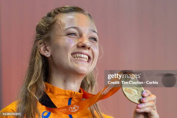 August 24: Femke Bol of The Netherlands with her gold medal won in the Women's 400m Hurdles, during the medal ceremony at the medal plaza during the...