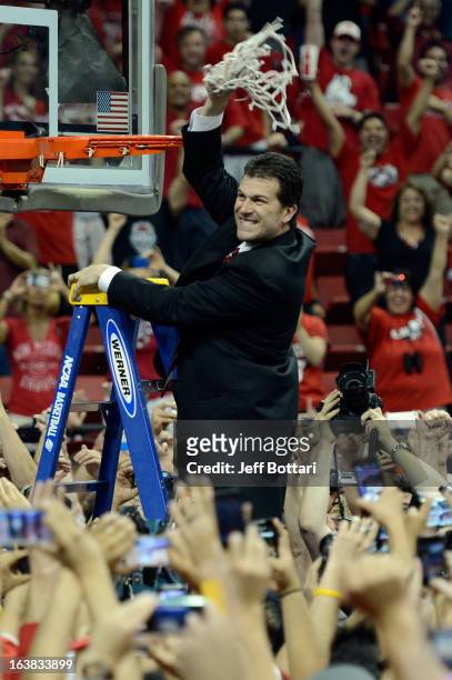 Head coach Steve Alford of the New Mexico Lobos cuts down the net after defeating the UNLV Rebels 63-56 to win the the championship game of the...