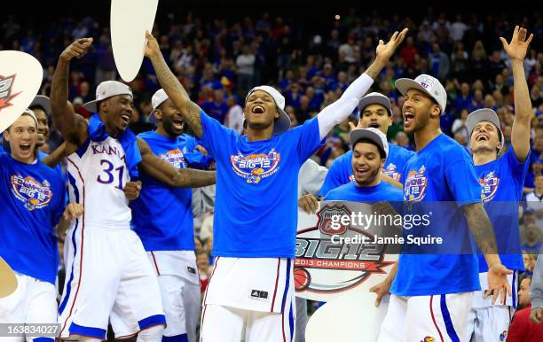 Ben McLemore of the Kansas Jayhawks and team celebrate their 70-54 win over Kansas State Wildcats during the Final of the Big 12 basketball...