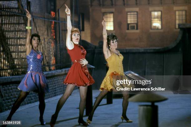 From left, American actresses Paula Kelly, Shirley MacLaine , and Chita Rivera dance in a scene from the film 'Sweet Charity' at Universal Studios,...