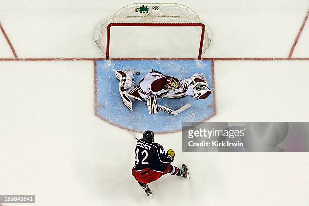 Artem Ansimov of the Columbus Blue Jackets beats Mike Smith of the Phoenix Coyotes for a goal during the shootout on March 16, 2013 at Nationwide...