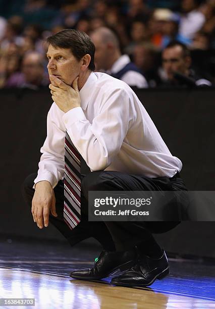 Washington State Cougars head coach Ken Bone looks on against the Washington Huskies during the first round of the Pac 12 Tournament at the MGM Grand...