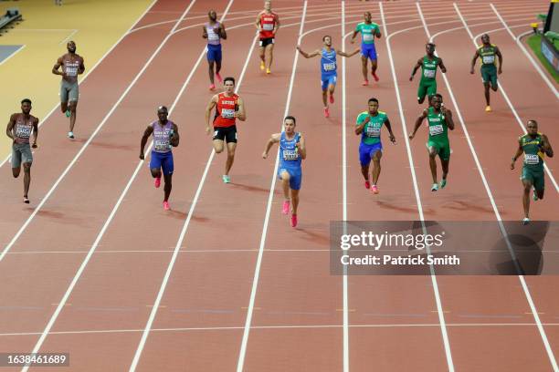 Filippo Tortu of Team Italy competes in the Men's 4x100m Relay Heats during day seven of the World Athletics Championships Budapest 2023 at National...