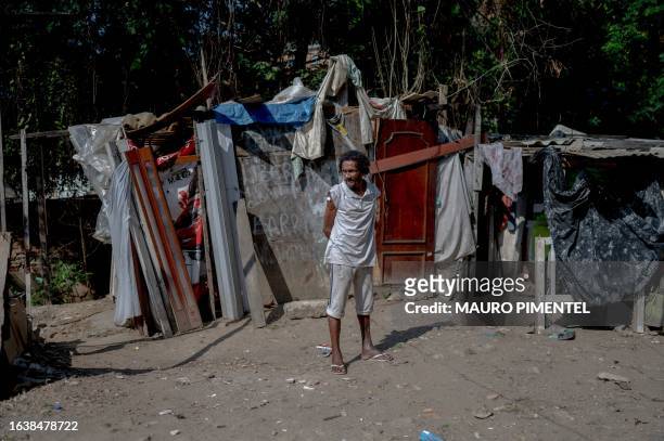 Homeless man is seen inside a homeless encampment at the Complexo do Lins favela, located in north Rio de Janeiro, Brazil on July 12, 2023. Thirteen...