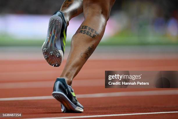 Detailed view of the 'believe in yourself' tattoo of Michelle-Lee Ahye of Team Trinidad and Tobago in the Women's 4x100m Relay Heats during day seven...