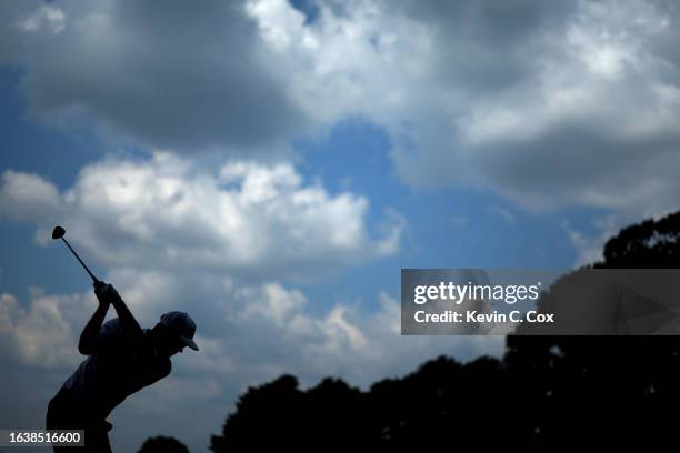 Corey Conners of Canada plays his shot from the third tee during the second round of the TOUR Championship at East Lake Golf Club on August 25, 2023...