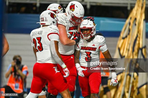 Louisville wide receiver Kevin Coleman reacts after catching a touchdown pass during the Aflac Kickoff Game between the Louisville Cardinals and the...