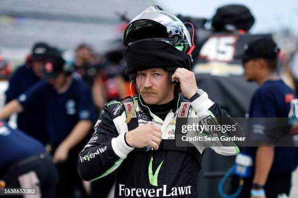 Jeffrey Earnhardt, driver of the Ark Encounter Chevrolet, prepares to qualify for the NASCAR Xfinity Series Wawa 250 powered by Coca-Cola at Daytona...
