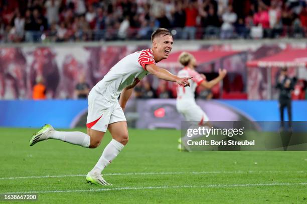 Dani Olmo of RB Leipzig celebrates after scoring the team's second goal during the Bundesliga match between RB Leipzig and VfB Stuttgart at Red Bull...