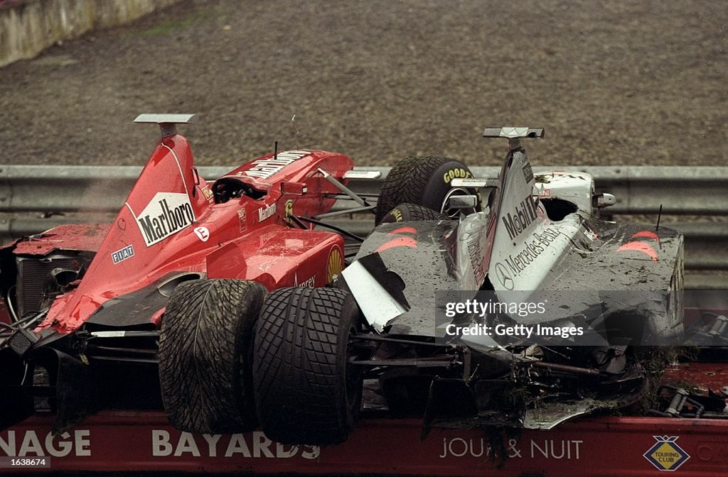 Eddie Irvine's Ferrari and David Coulthards Maclaren Mercedes