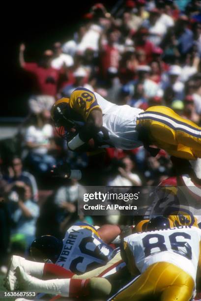 Fullback Robert Delpino of the Los Angeles Rams scored on a 1yard Touchdown leap over the pile in the game between the Los Angeles Rams vs the San...