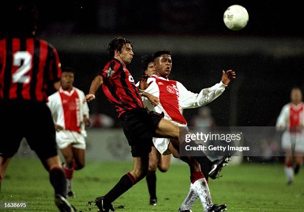 Patrick Kluivert of Aiax is stopped by the Milan defence during the Champions League at the Amsterdam Arena in Amsterdam, Netherlands. Ajax won the...