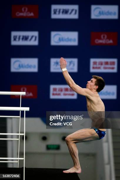 Victor Minbaev of Russia competes in the Men's 10m Platform final during the day three of the FINA Diving World Series Beijing Station at the...