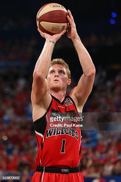 Rhys Carter of the Wildcats shoots a free throw during the round 23 NBL match between the Perth Wildcats and the Cairns Taipans at Perth Arena on...