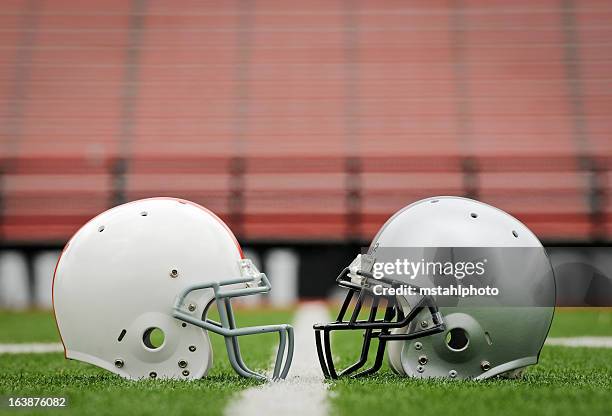 football the big game - football helmet stock pictures, royalty-free photos & images