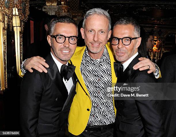Dean Caten, Patrick Cox and Dan Caten attend a drinks reception celebrating Patrick Cox's 50th Birthday party at Cafe Royal on March 15, 2013 in...
