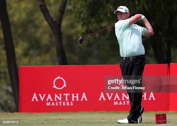 David Drysdale of Scotland tees off on the 5th hole during day four of the Avantha Masters at Jaypee Greens Golf Club on March 17, 2013 in Delhi,...