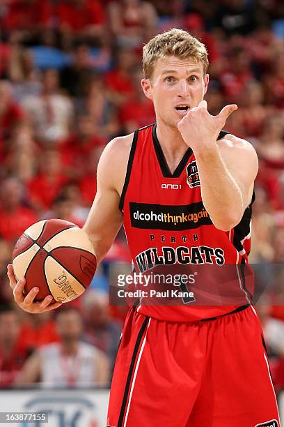 Rhys Carter of the Wildcats calls a play during the round 23 NBL match between the Perth Wildcats and the Cairns Taipans at Perth Arena on March 17,...
