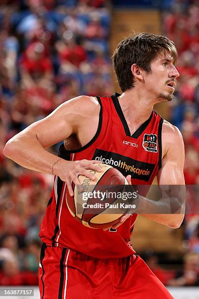 Greg Hire of the Wildcats looks to pass the ball during the round 23 NBL match between the Perth Wildcats and the Cairns Taipans at Perth Arena on...