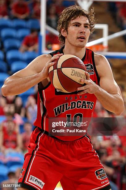 Ben Purser of the Wildcats looks to pass the ball during the round 23 NBL match between the Perth Wildcats and the Cairns Taipans at Perth Arena on...