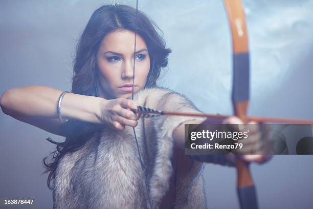 mysterious female archer - ancient female warriors stock pictures, royalty-free photos & images