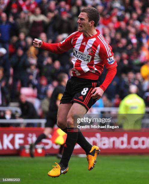 Craig Gardner of Sunderland celebrates scoring a penalty to make it 1-1 during the Barclays Premier League match between Sunderland and Norwich City...