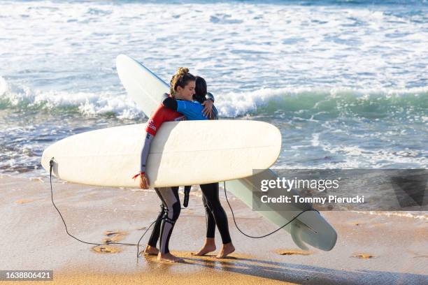 Longboard Champion Soleil Errico of the United States and Avalon Gall of Australia after surfing in Heat 2 of the Quarterfinals at the Bioglan Bells...