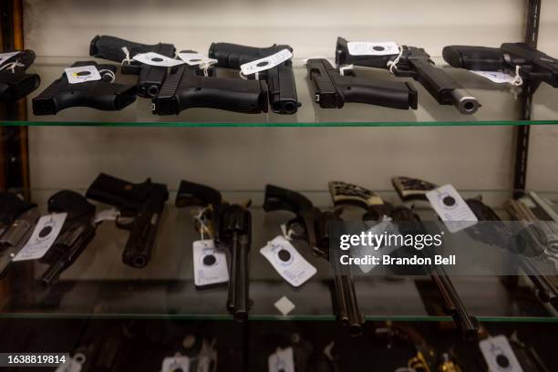 Semi-automatic firearms are seen displayed on shelves in the McBride Guns Inc. Store on August 25, 2023 in Austin, Texas. The Biden administration...