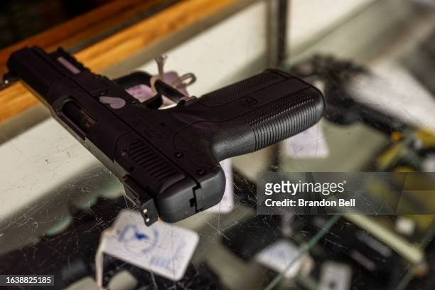 Semi-automatic firearm is seen displayed in the McBride Guns Inc. Store on August 25, 2023 in Austin, Texas. The Biden administration plans to revoke...