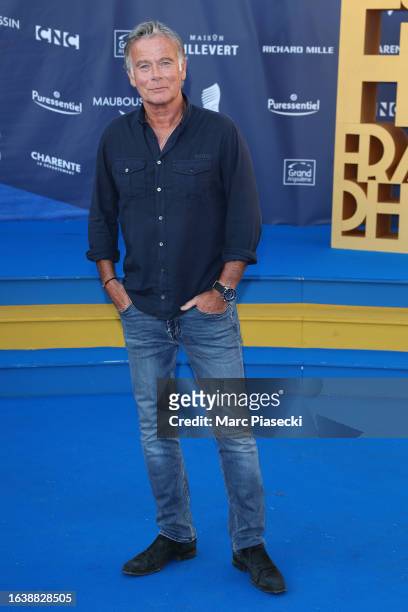 Franck Dubosc attends the 'Nouveau Depart' Photocall during Day Four of the 16th Angouleme French-Speaking Film Festival on August 25, 2023 in...