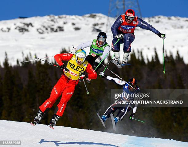 Unidentified athletes compete during the final of the Men's Audi FIS World Cup Ski Cross event in Are, Sweden, on March 17, 2013. France's Jean...