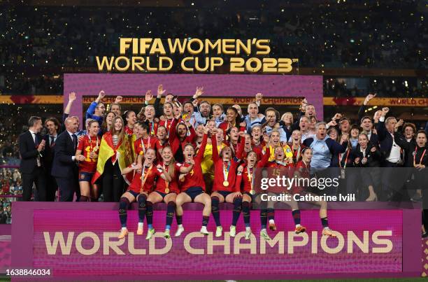 Luis Rubiales, President of the Royal Spanish Federation joins in the celebrations as Queen Letzia of Spain lifts the trophy, as the team celebrate...