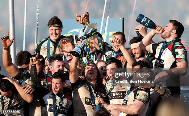 Harlequins captain Luke Wallace lifts the trophy following his team's victory during the LV= Cup Final between Sale Sharks and Harlequins at Sixways...